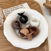 Pinza para cola de caballo alta con agarre redondo